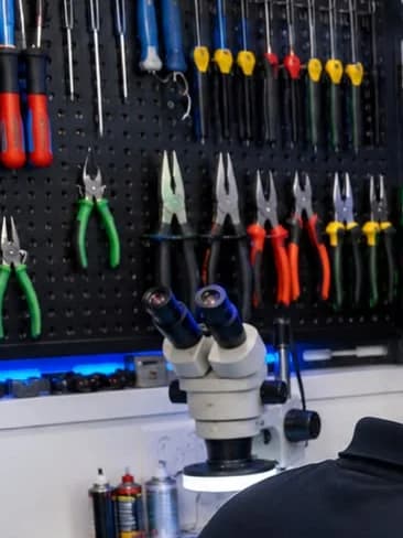 The lab toolwall and stereo microscope